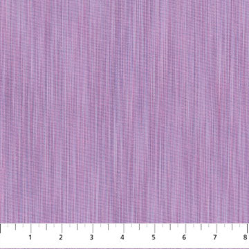 Carmon's Quilt Shop lavender space dye woven fabric with a subtle vertical textured pattern