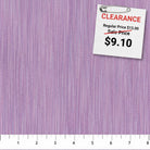 Carmon's Quilt Shop lavender space dye woven fabric with a textured vertical pattern for quilting and sewing projects.