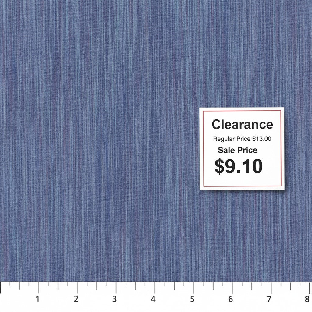 Carmon's Quilt Shop lavender space dye woven fabric with a textured vertical pattern