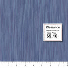 Carmon's Quilt Shop lavender space dye woven fabric with a textured vertical pattern