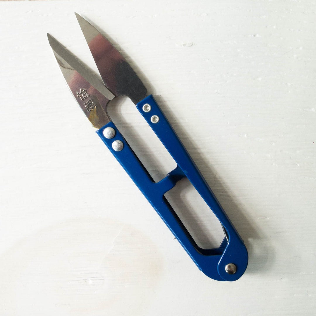 LDH Scissors thread snips XL from Carmon's Quilt Shop with sharp metal blades and a blue handle for precision sewing.