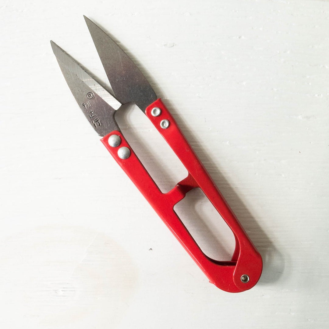 LDH Scissors thread snips XL from Carmon's Quilt Shop with sharp metal blades and a bright red handle for sewing