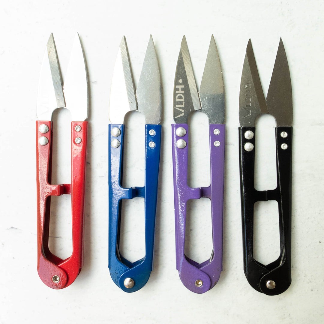 Carmon's Quilt Shop LDH Thread Snips XL in red, blue, purple, and black for precision sewing and quilting tasks.