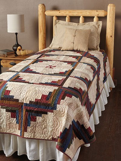 Carmon's Quilt Shop Log Cabin Variations quilt pattern featuring a traditional patchwork design in rustic earth tones.