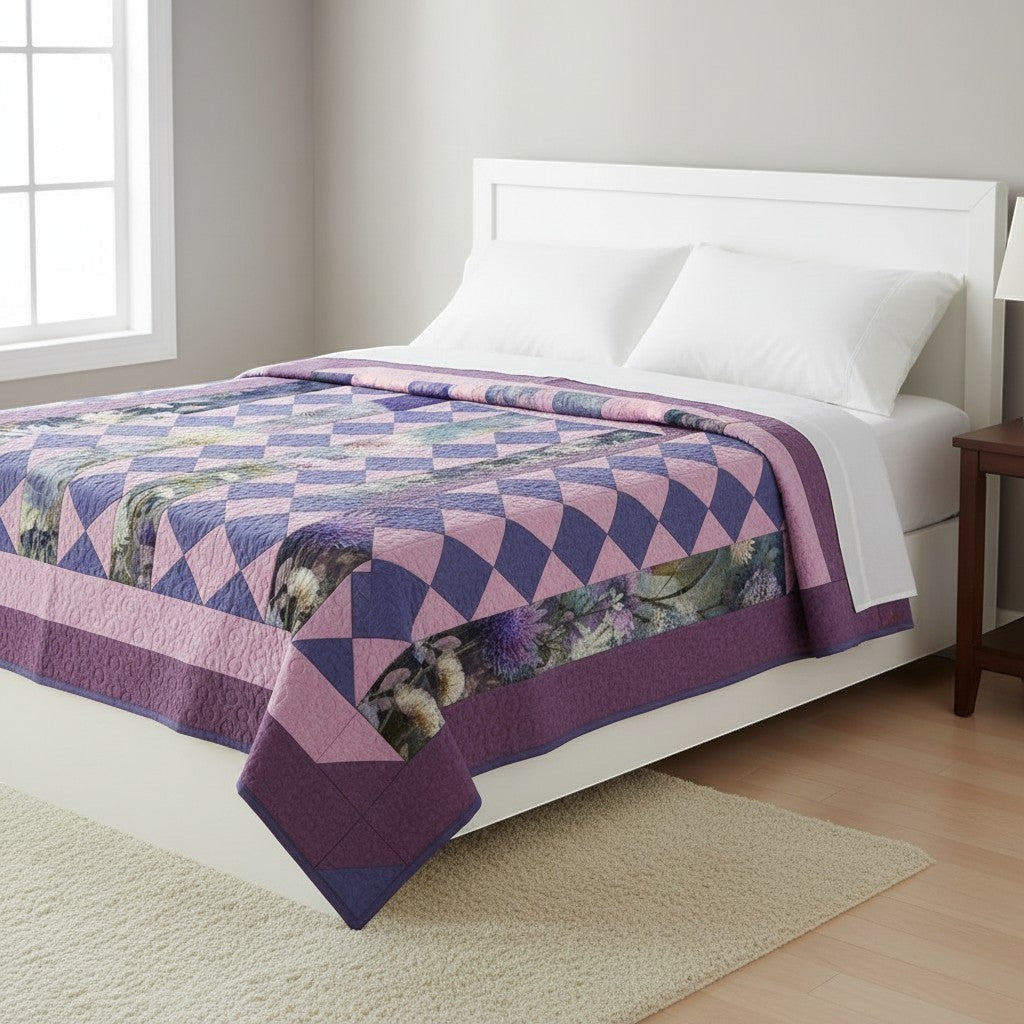 Lovely Flowers Quilt Pattern by Carmon's Quilt Shop featuring floral panels and purple diamond accents on a bed.