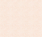 Carmon's Quilt Shop Main Street quilt kit fabric featuring a delicate white floral print on a soft peach background.