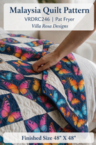Carmon's Quilt Shop Malaysia quilt pattern featuring vibrant butterfly fabric squares and white quilted accents.