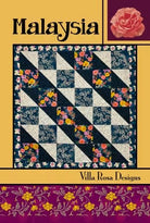 Carmon's Quilt Shop Malaysia quilt pattern by Villa Rosa Designs featuring black, white, and floral patchwork squares