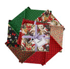 Carmon's Quilt Shop Merry Cats 8-piece fat quarter bundle featuring festive Christmas cotton fabrics with cat prints