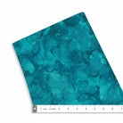 Carmon's Quilt Shop Mirage Adriatic abstract teal watercolor 100% cotton fabric with flowing ink design.