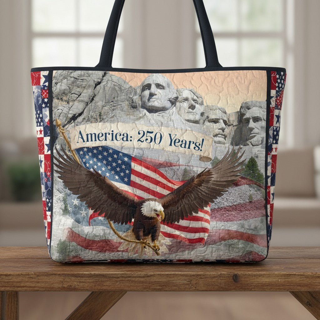 Carmon's Quilt Shop tote bag featuring a patriotic Mount Rushmore and bald eagle America 250 Years cotton fabric print.