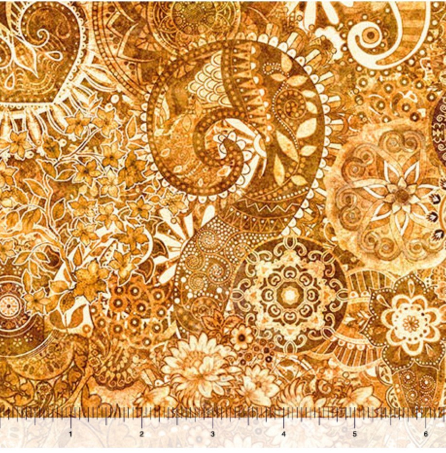 Carmon's Quilt Shop Mystique Blender 108 inch wide backing fabric with gold, brown, and cream paisley floral motifs.