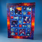 Carmon's Quilt Shop Space Odyssey Hopscotch NASA quilt featuring vibrant space imagery, astronauts, and rockets.