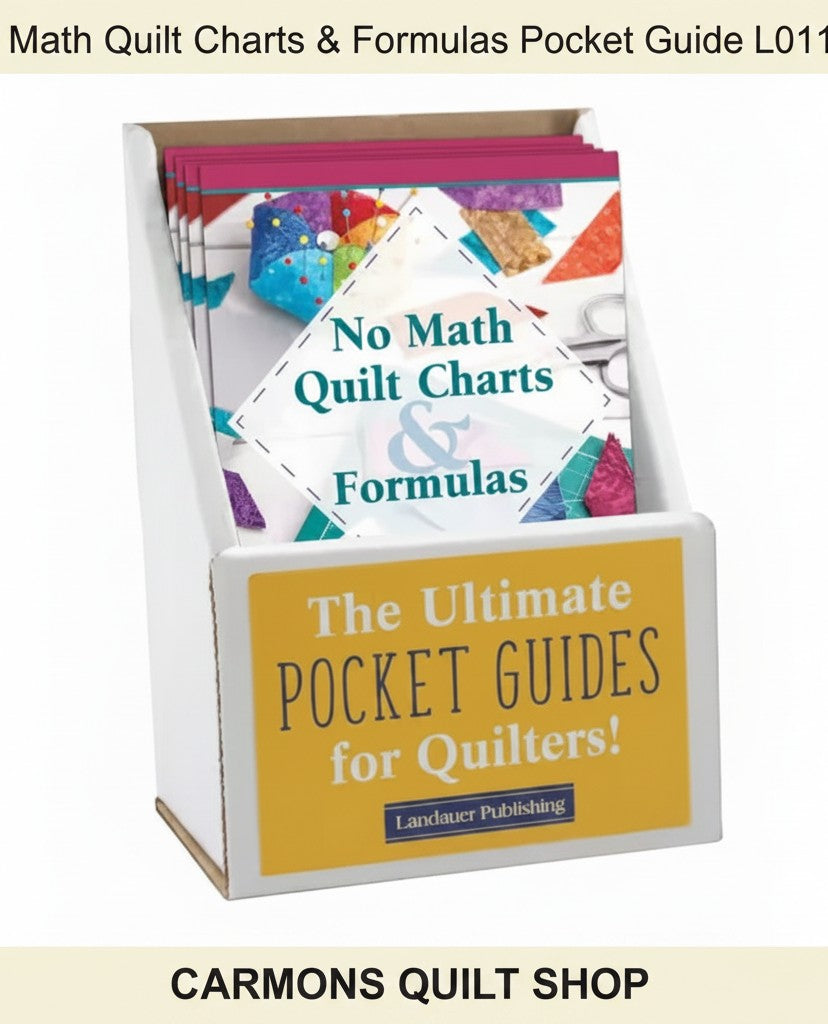 Carmon's Quilt Shop No Math Quilt Charts & Formulas pocket guide in a white display stand for easy reference.