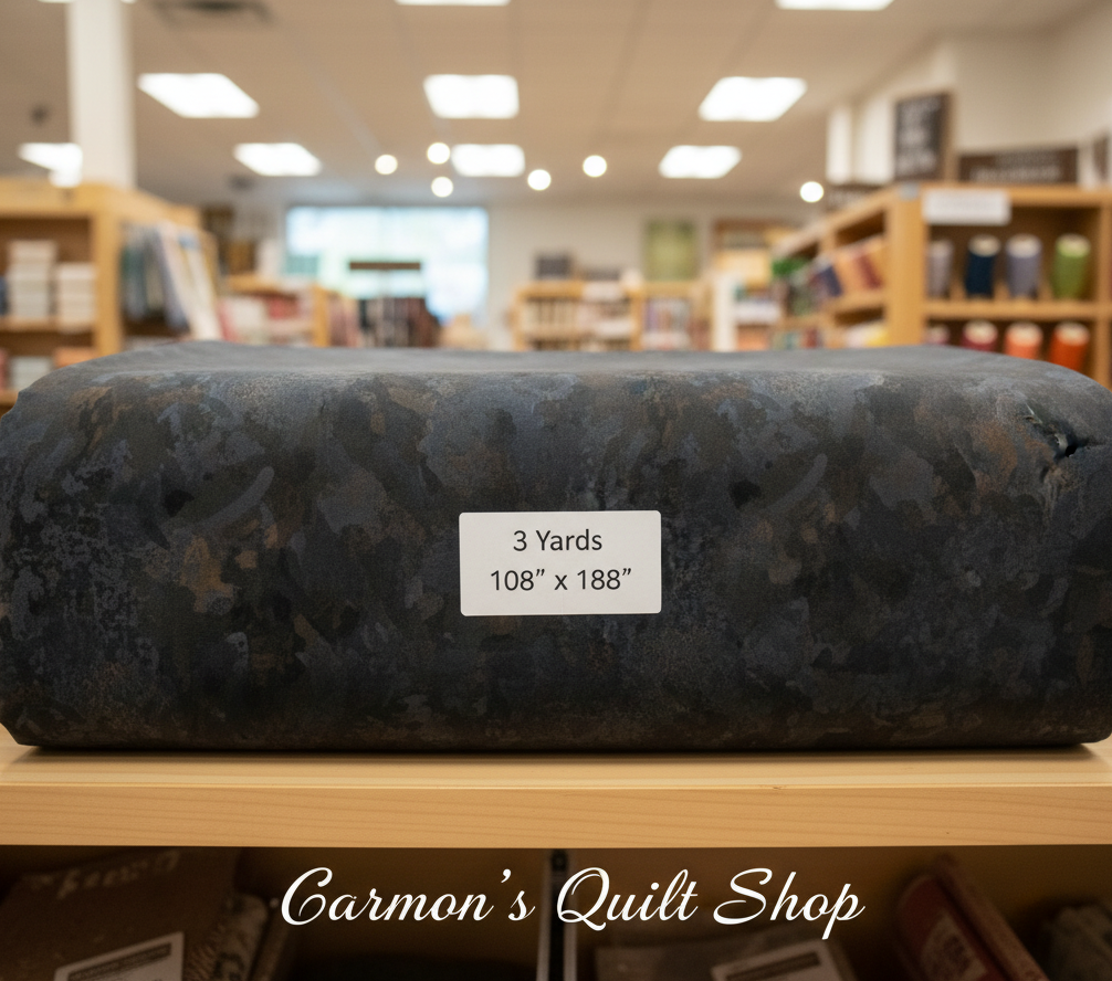 Carmon's Quilt Shop Chroma Obsidian black 108-inch wide cotton quilt backing fabric with a textured blender design.