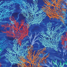 Carmon's Quilt Shop Oceana Coral 108 inch wide backing fabric with vibrant orange and blue coral on a deep blue base