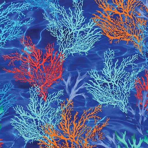 Carmon's Quilt Shop Oceana Coral 108 inch wide backing fabric with vibrant orange and blue coral on a deep blue sea