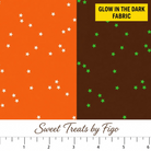 Carmon's Quilt Shop FIGO Fabrics Sweet Treat star print quilting cotton in orange with glow in the dark features