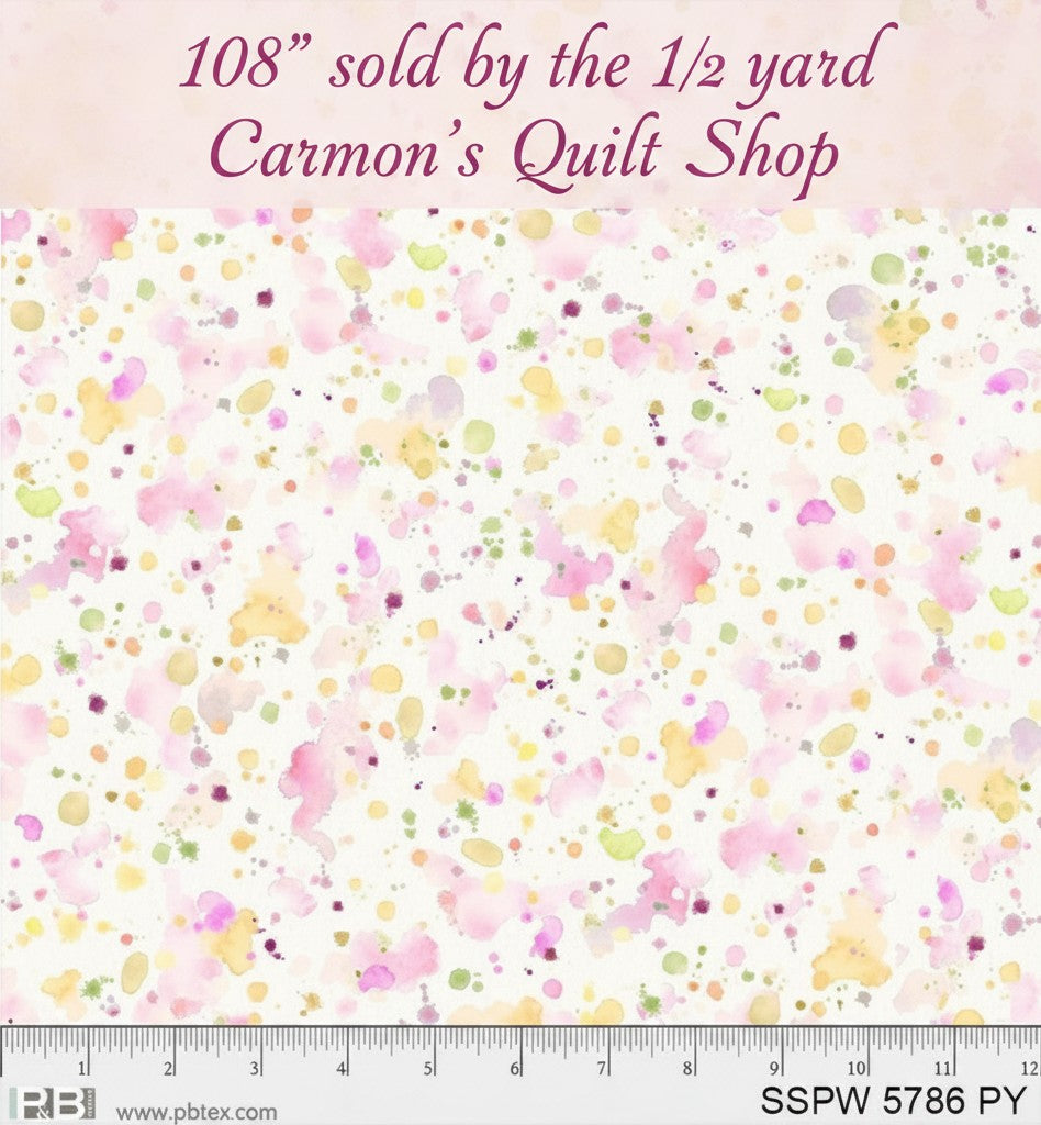 Carmon's Quilt Shop 108-inch wide cotton fabric with a colorful pink, yellow, and green paint splatter design.