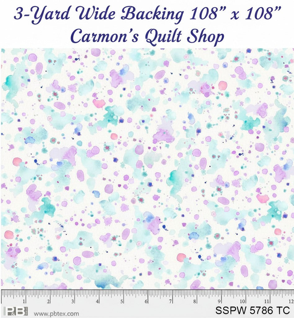Carmon's Quilt Shop 108 inch wide cotton backing fabric featuring a colorful paint splatter pattern on white
