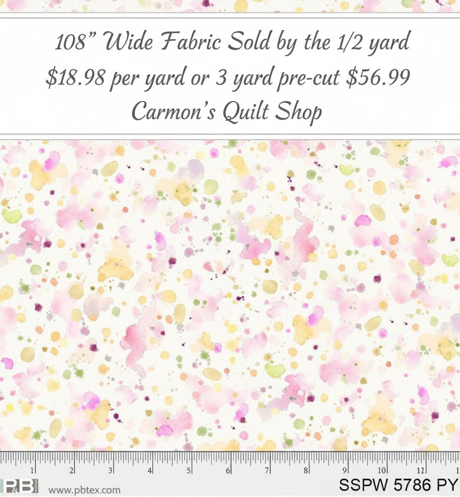 Carmon's Quilt Shop 108 inch wide cotton backing fabric featuring a colorful pink, yellow, and green paint splatter design.