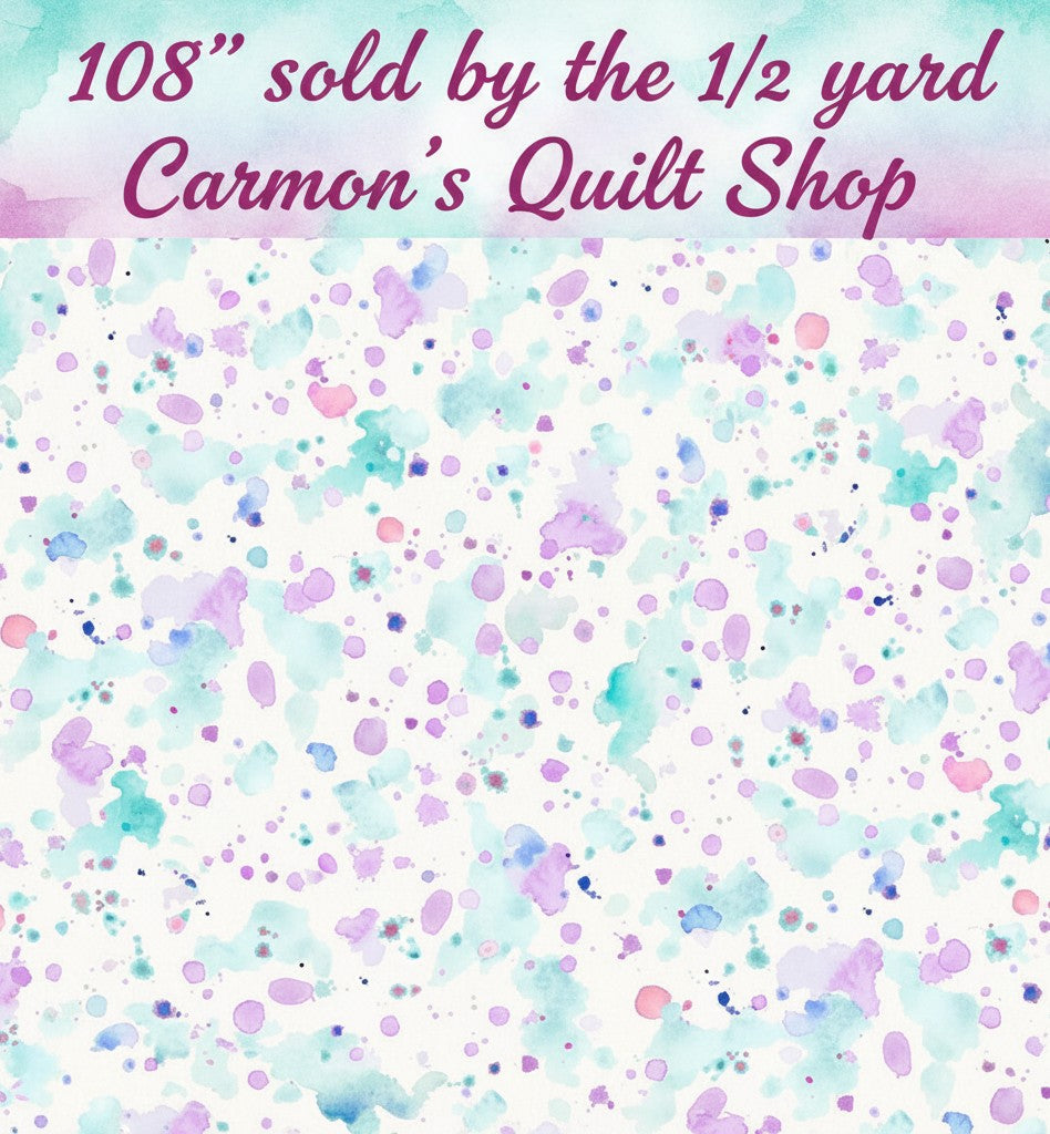 Carmon's Quilt Shop 108 inch wide cotton fabric featuring a colorful purple and teal paint splatter design.