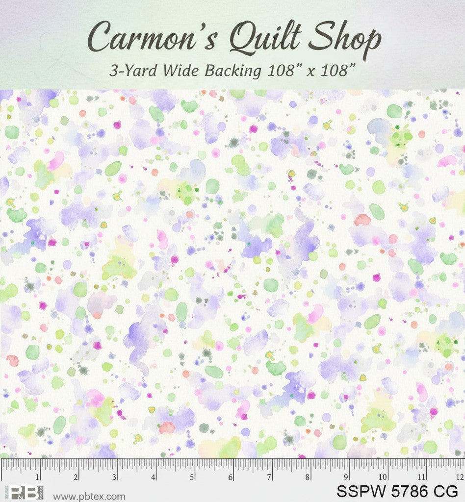 Carmon's Quilt Shop 108-inch wide cotton backing fabric featuring a colorful purple, green, and pink paint splatter print.