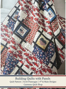 Carmon's Quilt Shop Building Quilts with Panels pattern featuring a patriotic quilt with red trucks and stars