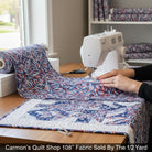 Carmon's Quilt Shop patriotic swirl 108-inch wide cotton quilt backing fabric being sewn on a sewing machine