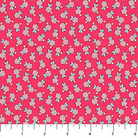 Carmon's Quilt Shop Quilting in Bloom cotton fabric featuring a pink floral spot feather design by Lorelai Kuecker.