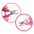 Carmon's Quilt Shop Sew Tasty pink mini spring-loaded scissors with stainless steel blades and a decorative tassel