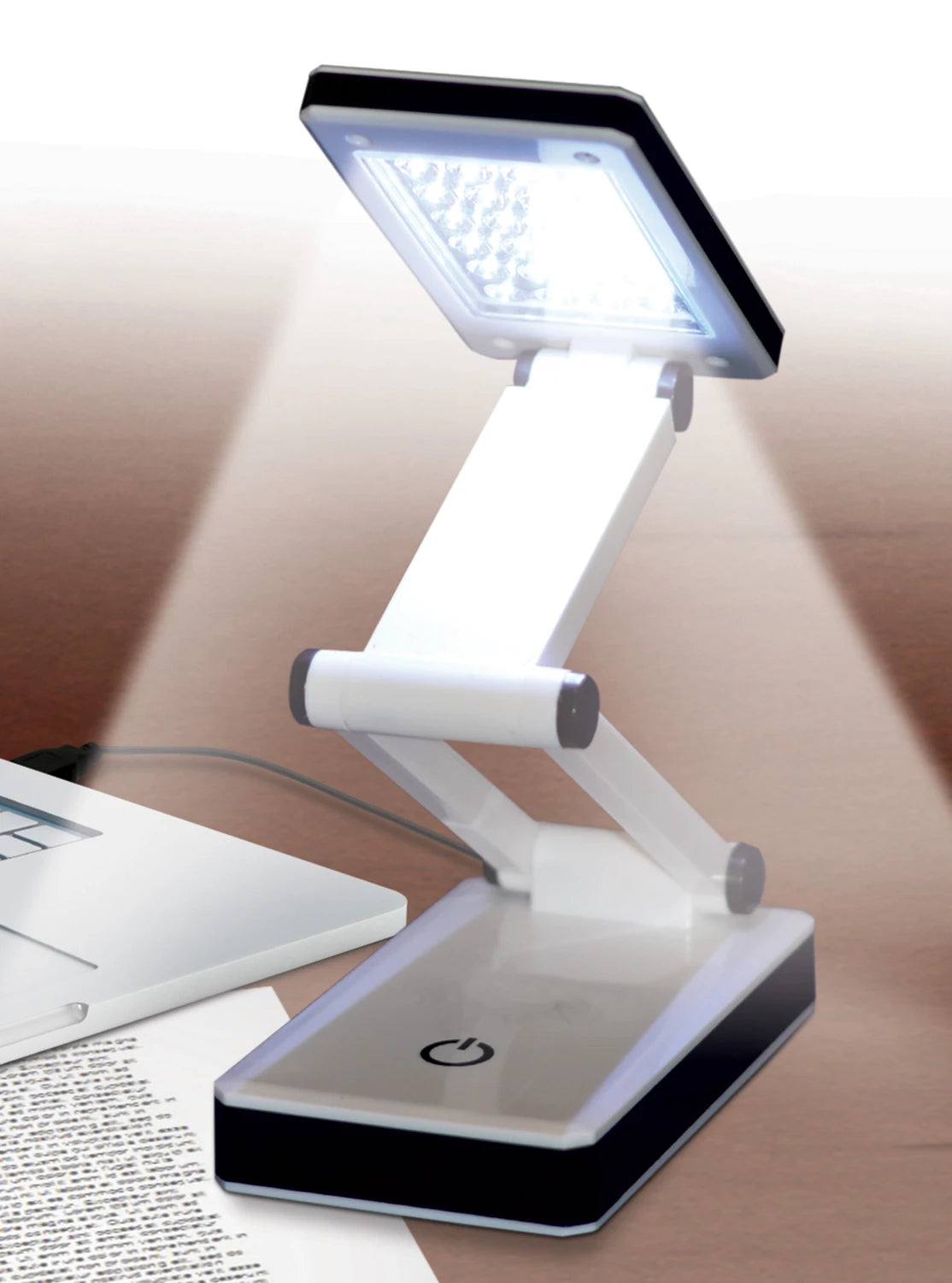 Carmon's Quilt Shop Frank A. Edmunds portable white and black LED lamp with adjustable brightness for crafting.