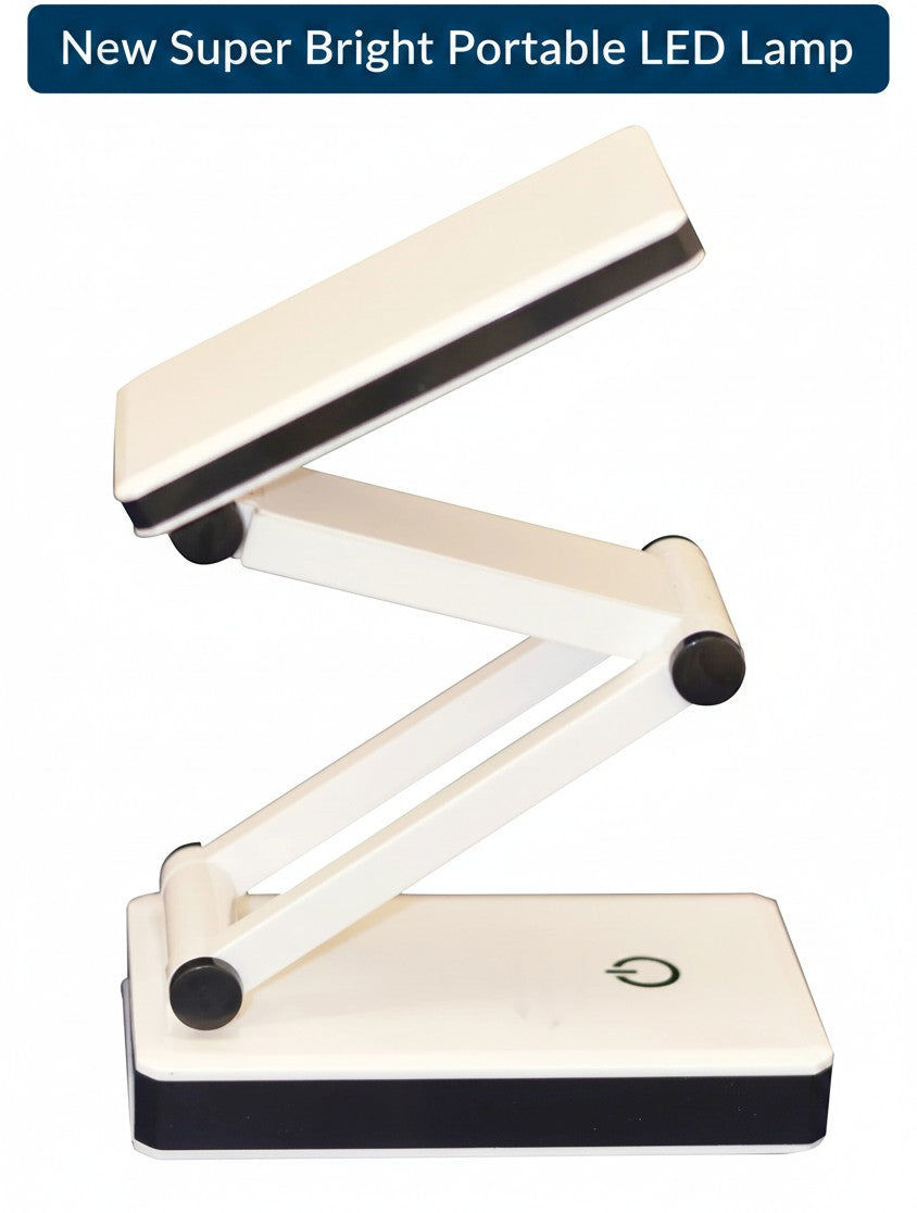 Carmon's Quilt Shop Frank A. Edmunds portable white and black LED lamp with adjustable folding design for crafting.