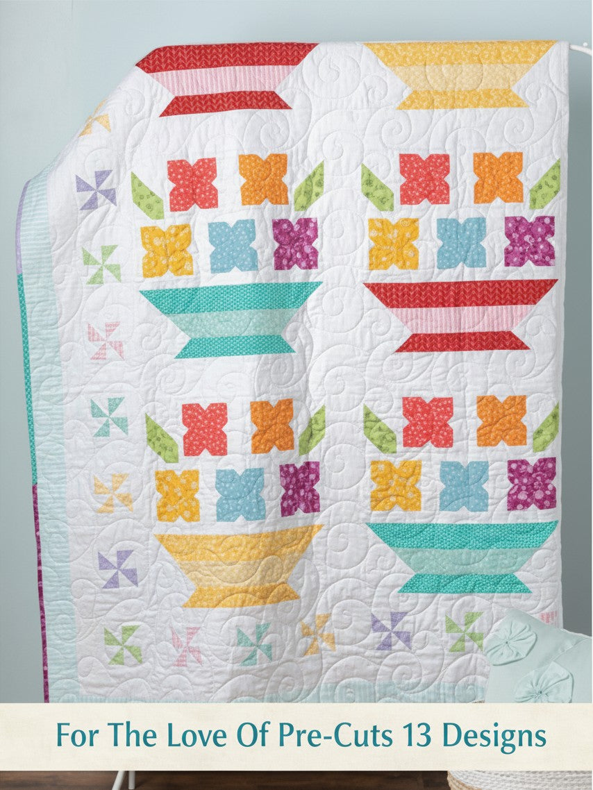 Carmon's Quilt Shop For the Love of Precuts quilt pattern book featuring a colorful floral basket quilt design