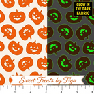 Carmon's Quilt Shop FIGO Fabrics Sweet Treat pumpkin cotton fabric with orange day and glow-in-the-dark night view
