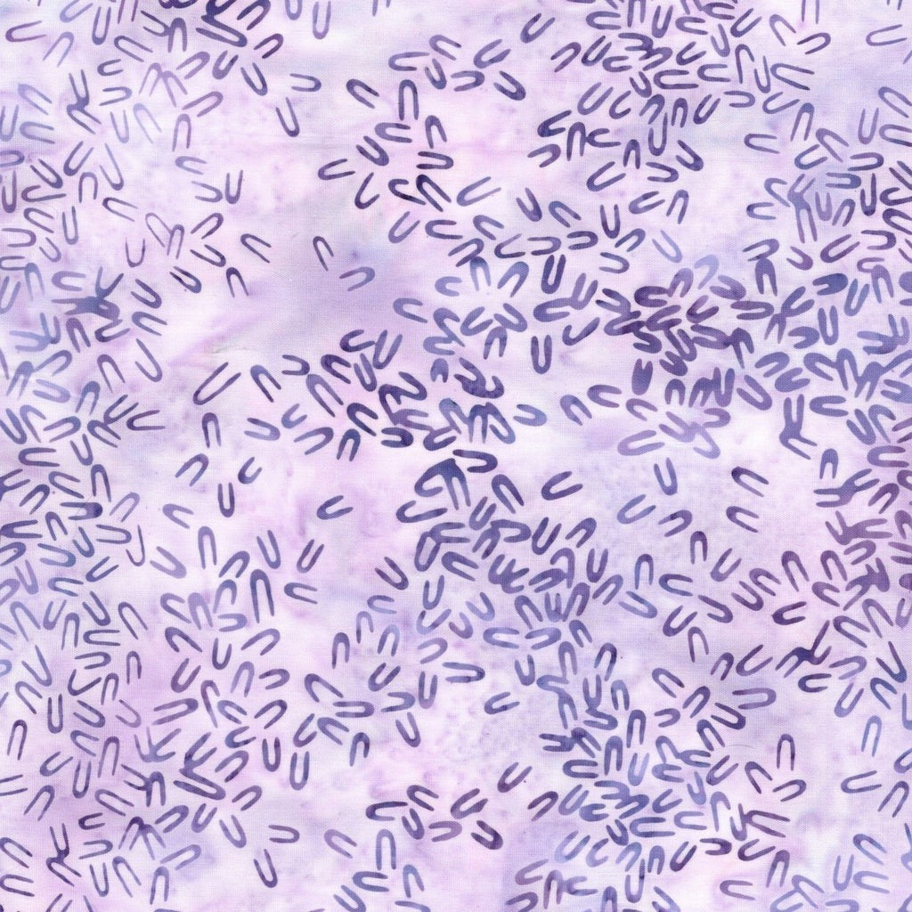 Carmon's Quilt Shop Island Batik Vintner's Treasure purple cotton fabric with small dark purple U-shaped patterns