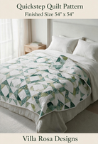 Carmon's Quilt Shop Quickstep quilt pattern featuring an interlocking green and white diamond design on a bed.