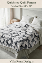 Carmon's Quilt Shop Quickstep quilt pattern by Villa Rosa Designs featuring a black and white interlocking diamond design