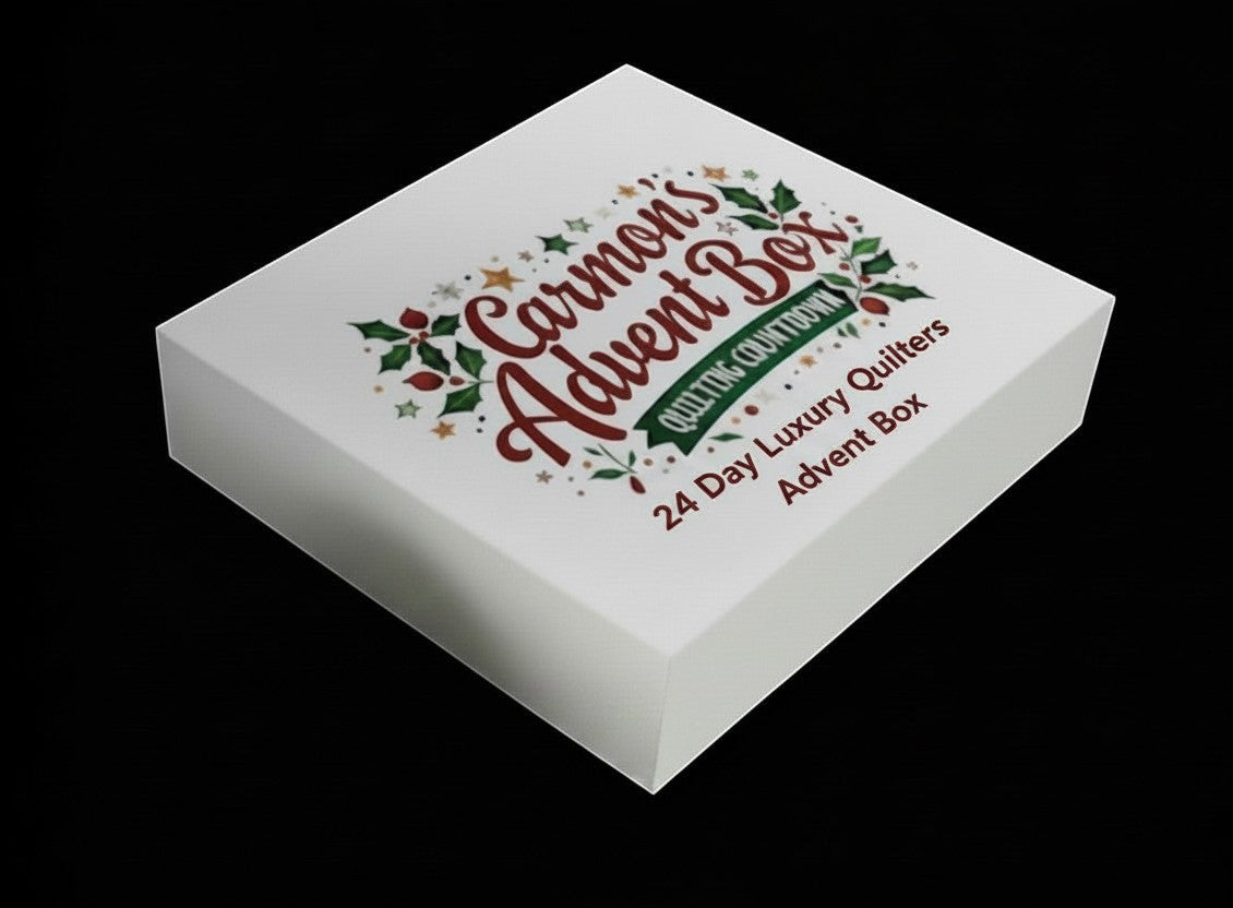 Carmon's Quilt Shop 24-day luxury quilting advent box with festive holiday branding on a white gift box.