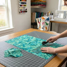 Carmon's Quilt Shop Raven's Call dark teal abstract swirl 100% cotton quilt fabric.