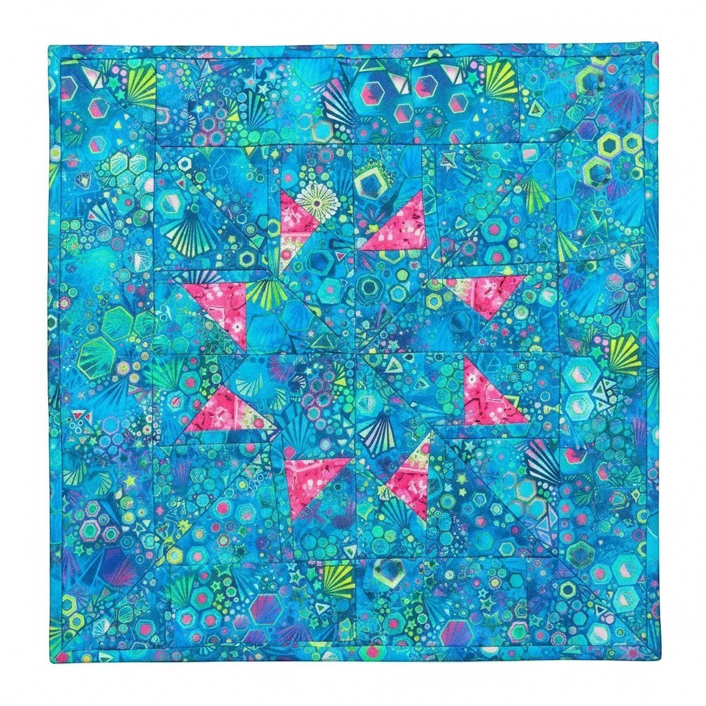 Carmon's Quilt Shop Robert Kaufman Pacific Phantasma 100% cotton fabric in fiesta colors with geometric patterns.