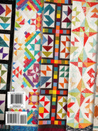 Carmon's Quilt Shop Mix & Match Quilt Sampler Settings book cover featuring colorful geometric patchwork quilt designs