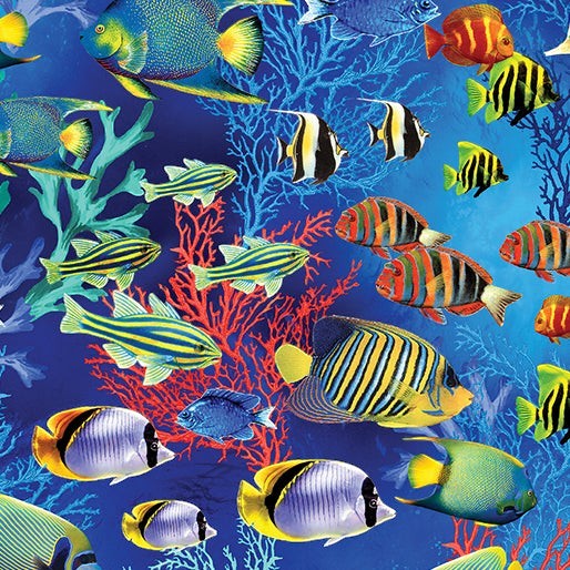 Carmon's Quilt Shop Jewel of The Sea cotton fabric featuring colorful tropical fish and coral on a deep blue background