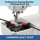 Carmon's Quilt Shop professional sewing machine cleaning brush set with pink and red brushes cleaning a machine