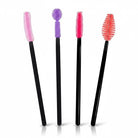 Carmon's Quilt Shop set of four cleaning brushes with black handles and colorful silicone bristles for sewing machines