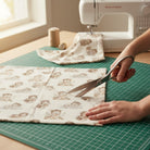 Carmon's Quilt Shop Soaring Dreams cream 100% cotton fabric featuring watercolor aviator bears on clouds. Ideal for quilting.