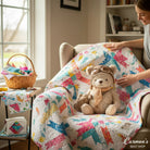 Carmon's Quilt Shop Soaring Dreams cream 100% cotton fabric with colorful geometric star pattern. Ideal for quilting.