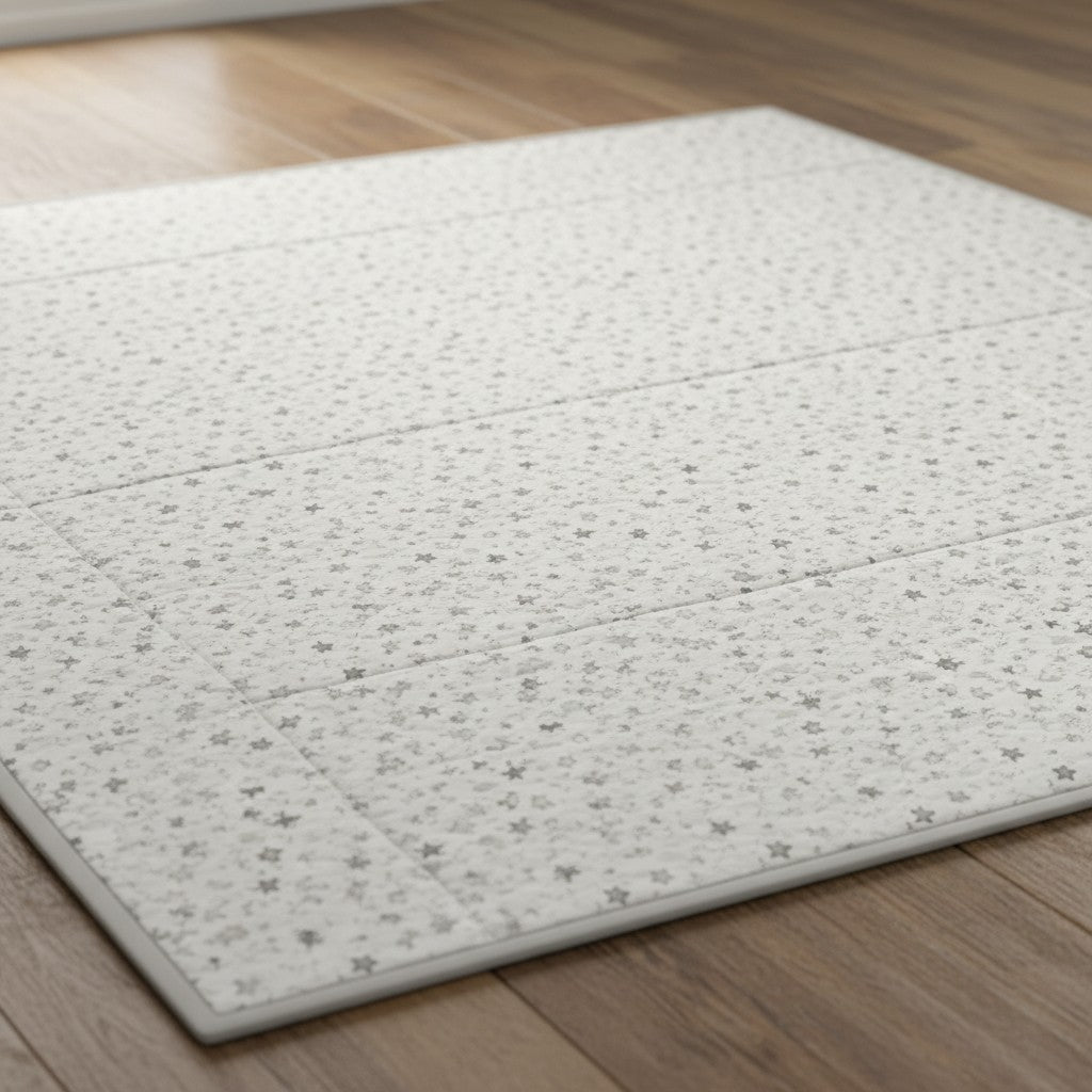 Carmon's Quilt Shop Soaring Dreams white stars fabric, 100% cotton, gray-blue hue, ideal for quilting projects.