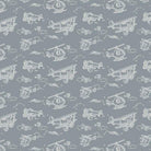 Carmon's Quilt Shop Soaring Dreams Teal Fabric features white line drawings of biplanes, helicopters, and clouds on a gray-blue background. 100% cotton.