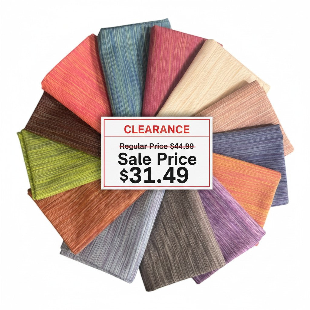 Carmon's Quilt Shop Figo Studio Space Dye fat quarter bundle featuring 13 colorful textured fabric pieces in a circle